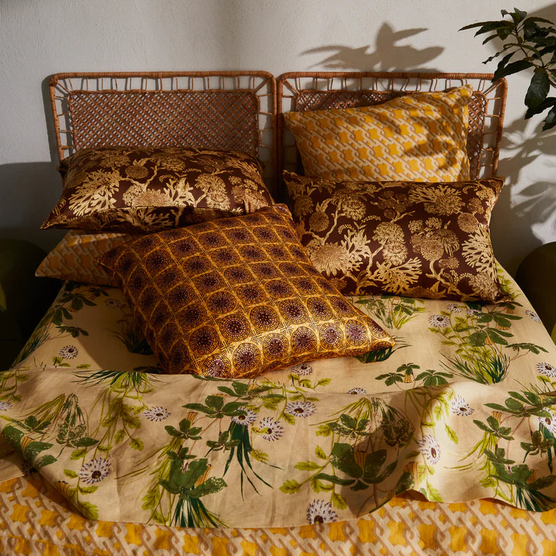 Delphine Silk Pillowcase Dolce by Sage & Clare displayed on a bed