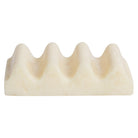 Pearl wave-shaped soap dish in creamy white with subtle marbled veining, front view on white background