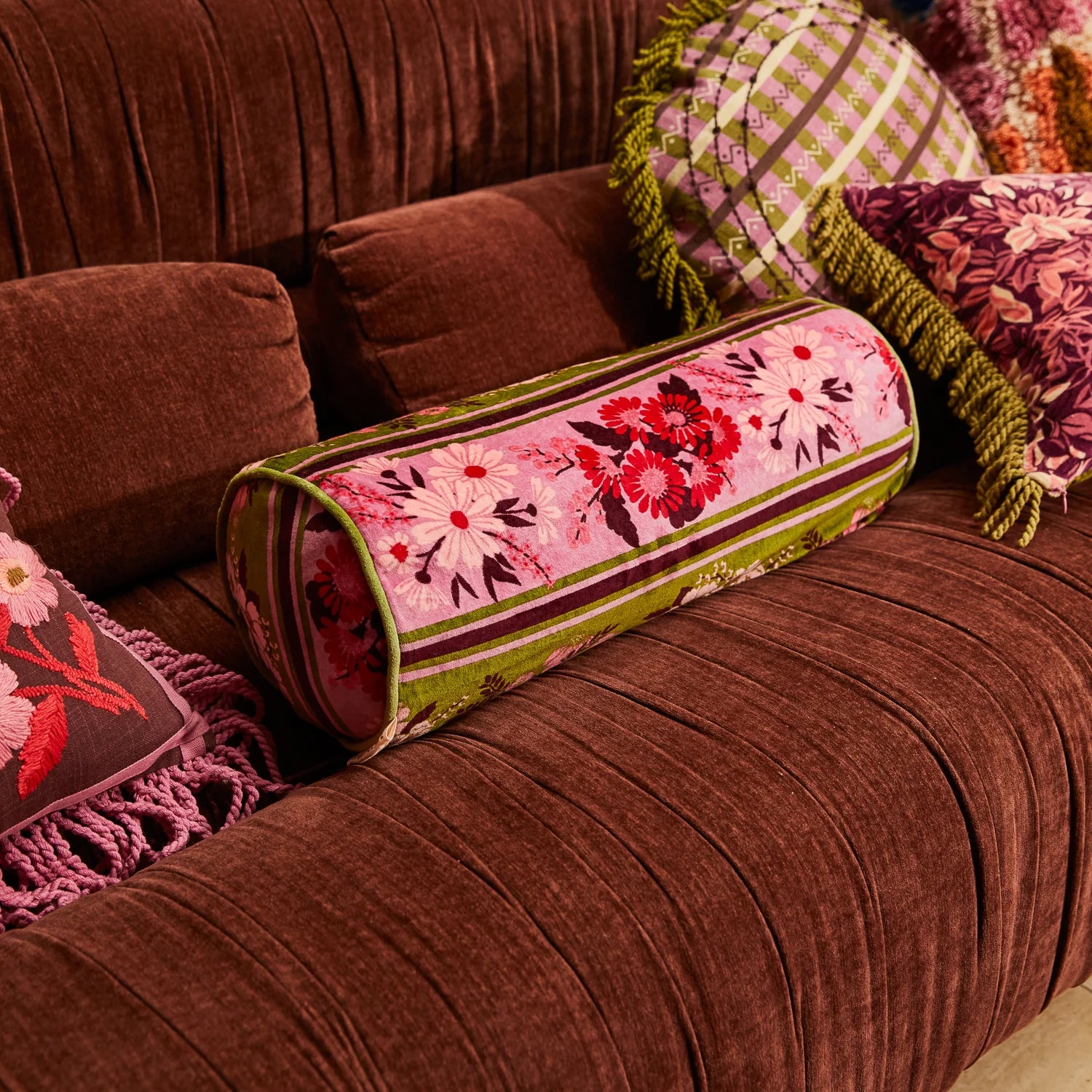 Devi Velvet bolster on a lounge