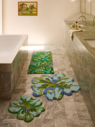 Bathroom styling shot of Dutch Floral Green Long Bath Mat paired with matching floral bath mats