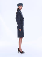 Side profile view of Emma Utility Suede Jacket displaying knee-length silhouette and utility pocket details