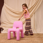 Full body view showing Kids Knit Vest with sleeveless design and ribbed neckline armholes