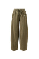 Front view flat lay of washed olive barrel trackpant with elastic waistband and drawstring