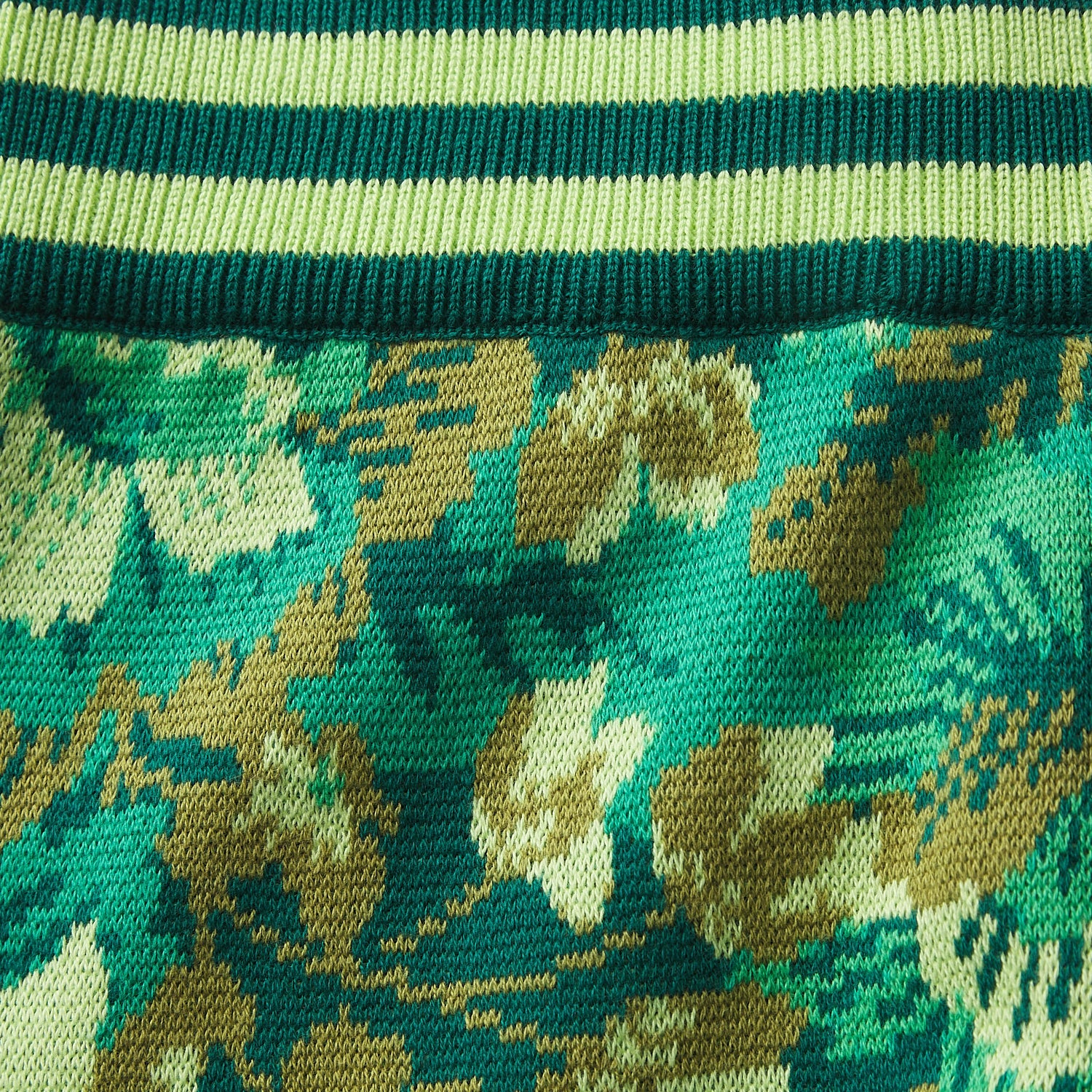 Close-up of striped waistband and floral pattern transition on Sage & Clare Eliza Knit Pants