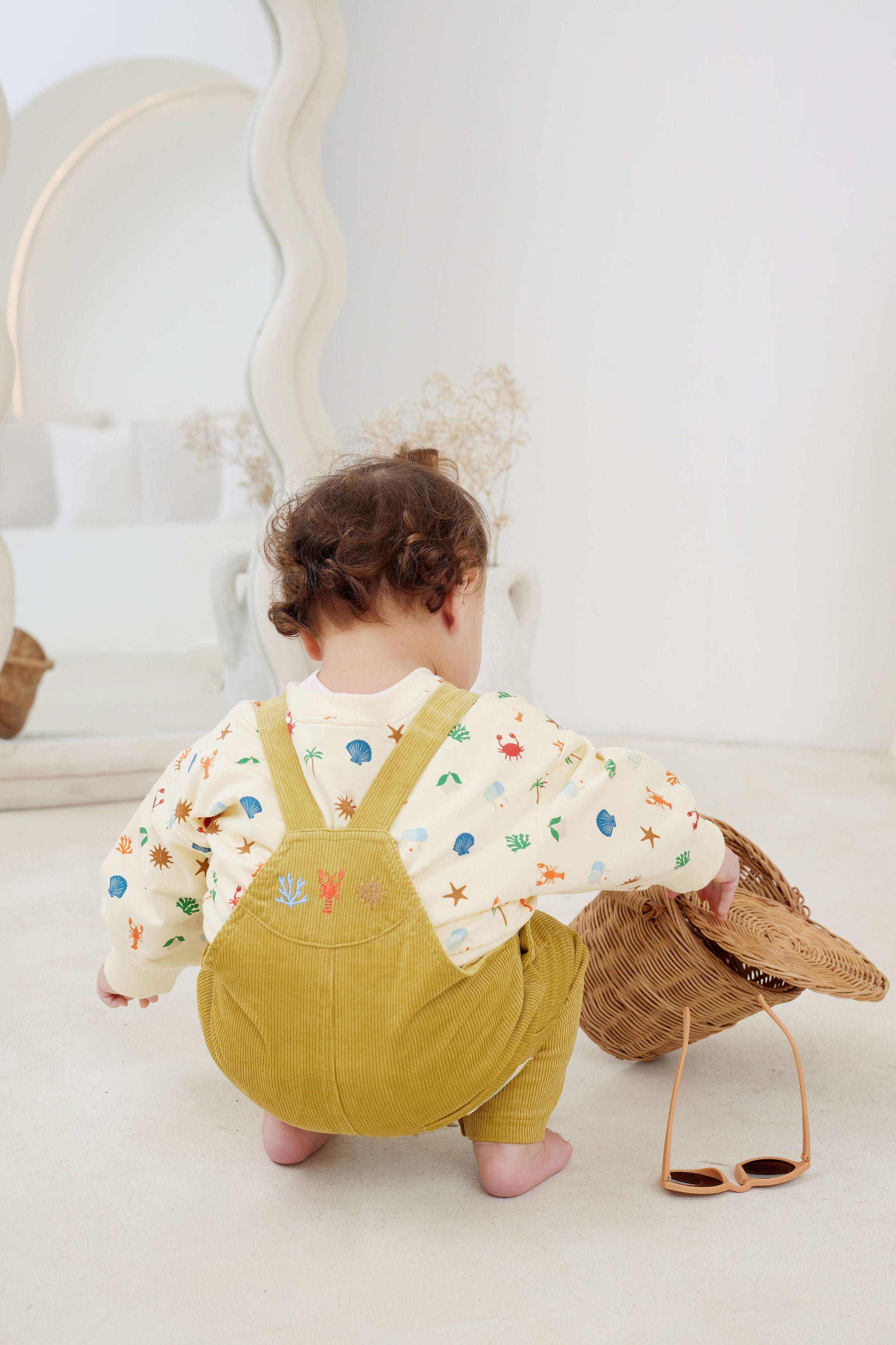 Back view of toddler in the Endless Summer Oversized Jumper | Kapow Kids
