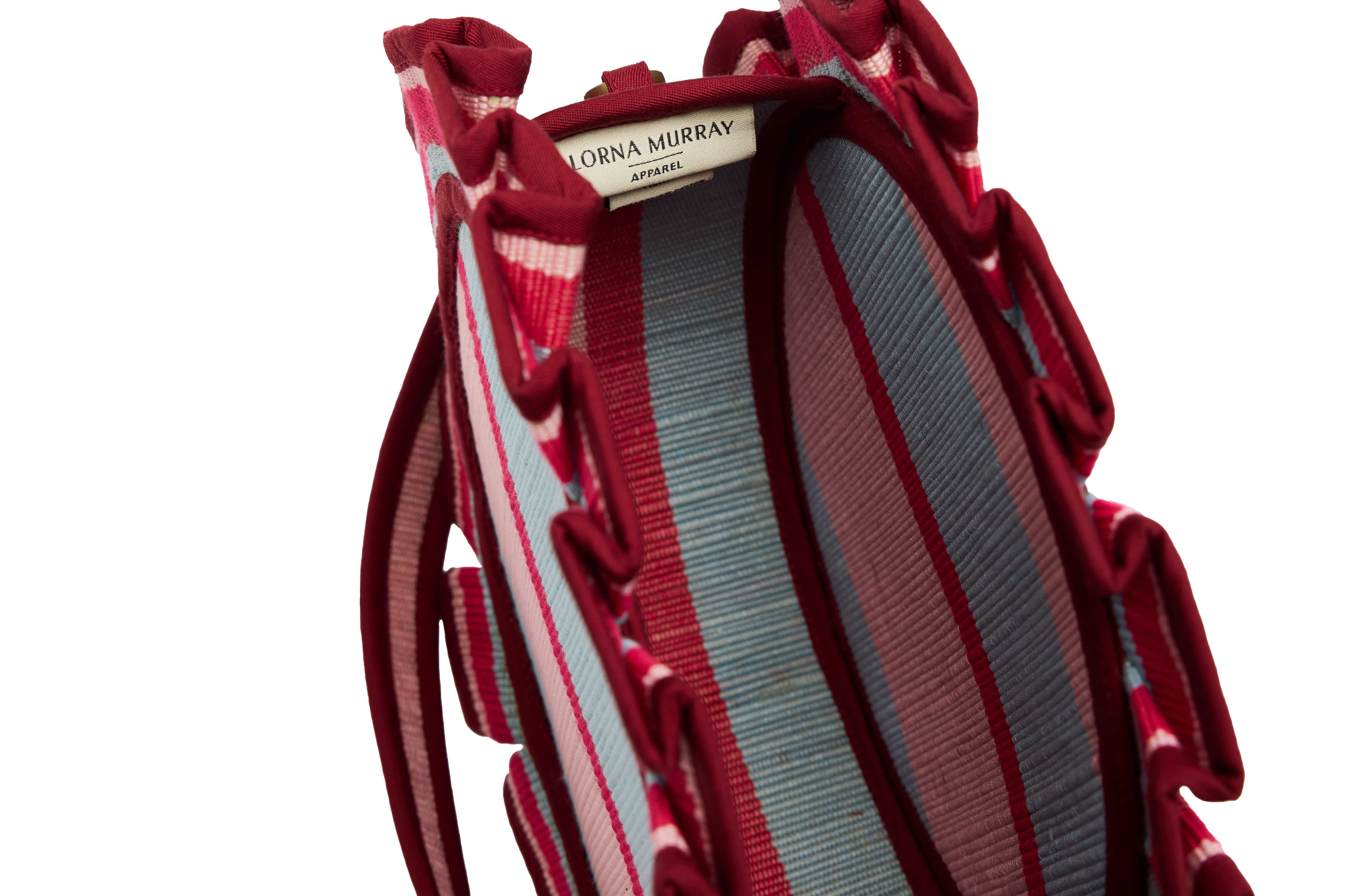Close-up interior view of Lorna Murray tote showing striped lining and brand label detail