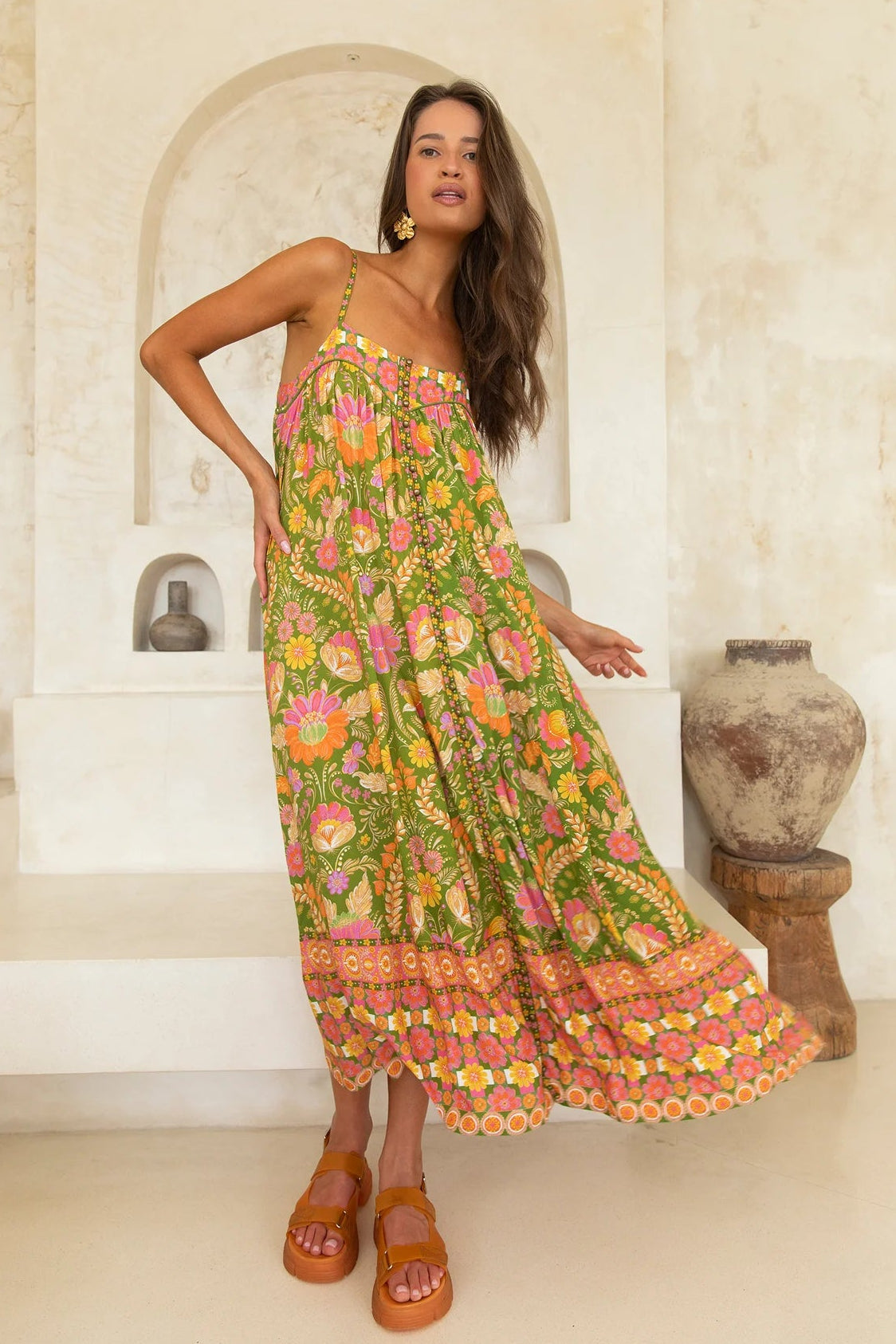 Estella Dress Guava by Nine Lives Bazaar midi length flowy silhouette brass buttons ruffle hem