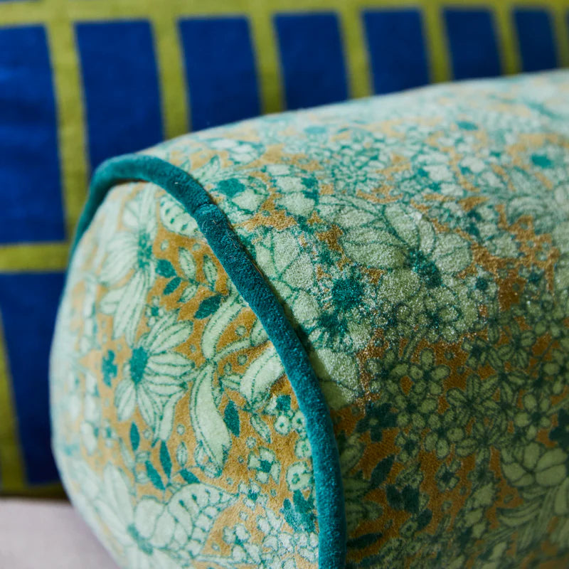 Details of green floral Evette Velvet Bolster by Sage & Clare