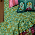 Evette cotton fitted sheet by Sage and Clare with olive green floral print