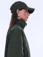 Side angle view of Fallon Check Cap displaying check pattern and structured baseball cap silhouette