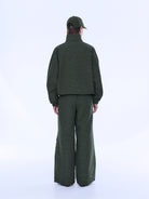 Back view of Fallon Zip Thru Jacket showing olive check pattern and cropped bomber style