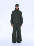 Front view of Fallon Zip Thru Jacket in olive check with ribbed cuffs and hem detail