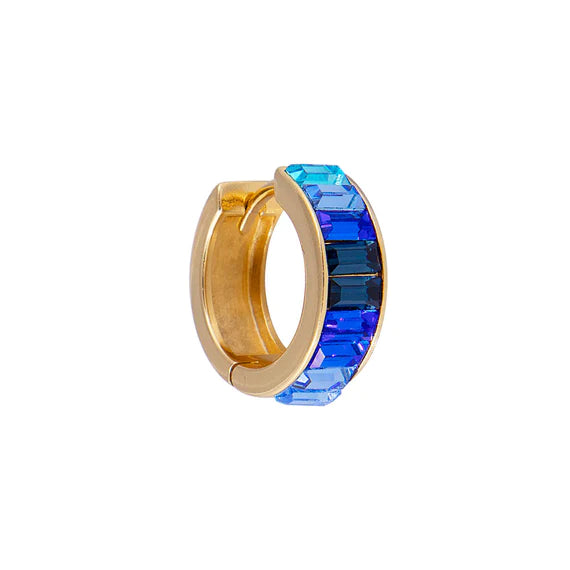 Blue stone in gold setting by Fairley