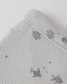 Close up of shorts fabric and print on the Finn Rashguard + Short Set Fish | Quincy Mae