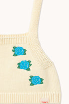 close up embroidery detail of blue flowers on Flowers Knitted Crop Top - Light Cream by Tiny Cottons