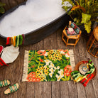Floral green, orange and yellow bath mat by Sage & Clare