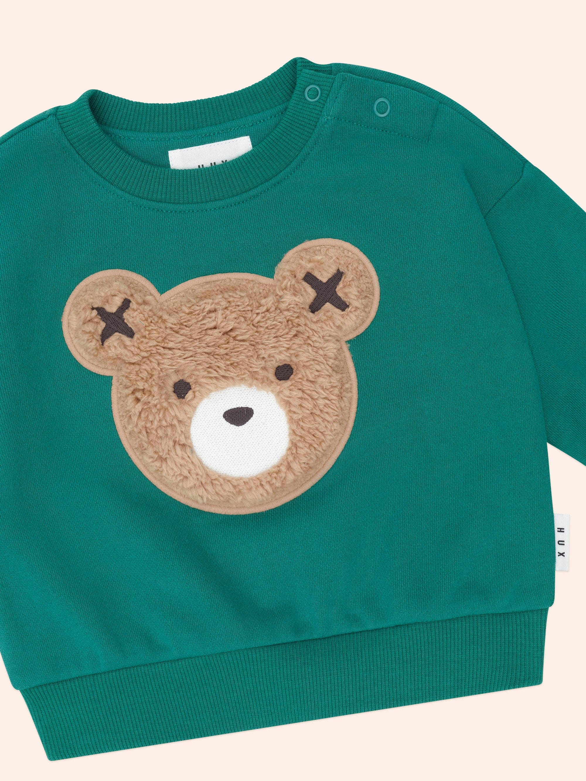 Close up of the Furry Huxbear Emerald Sweatshirt | Huxbaby