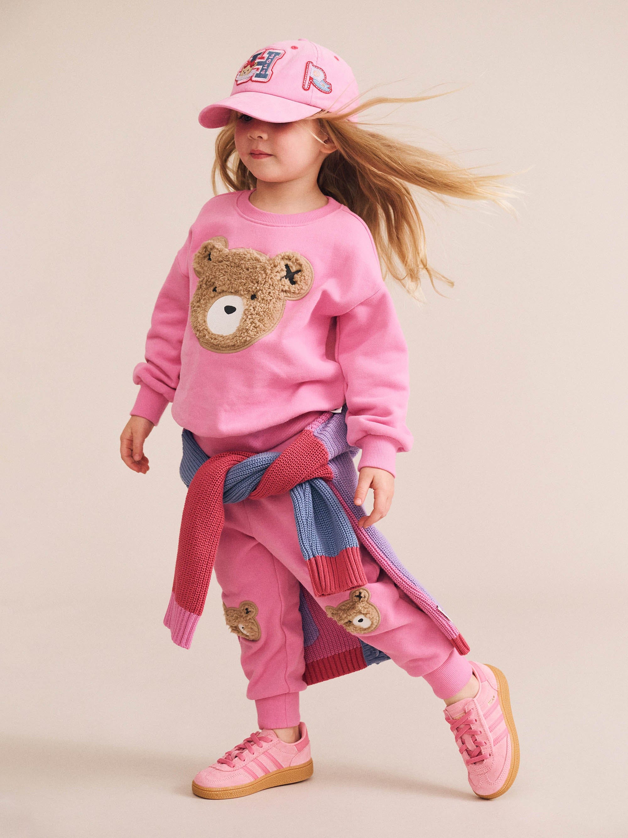Young girl wearing the Furry Huxbear Sweatshirt | Huxbaby