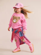 Young girl wearing the Furry Huxbear Sweatshirt | Huxbaby