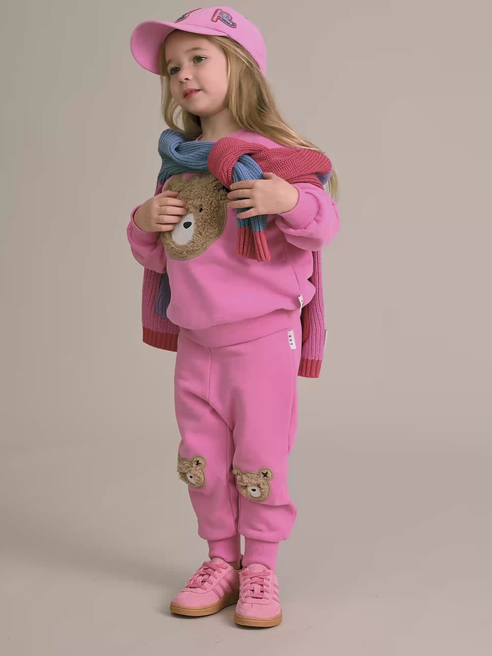 Kid wearing the pink Furry Huxbear Sweatshirt | Huxbaby