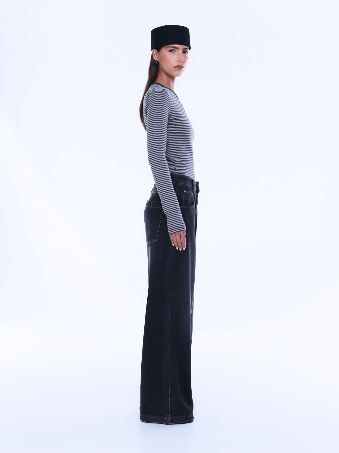 Side profile of Georgia Denim Jean displaying full length wide leg silhouette and relaxed fit