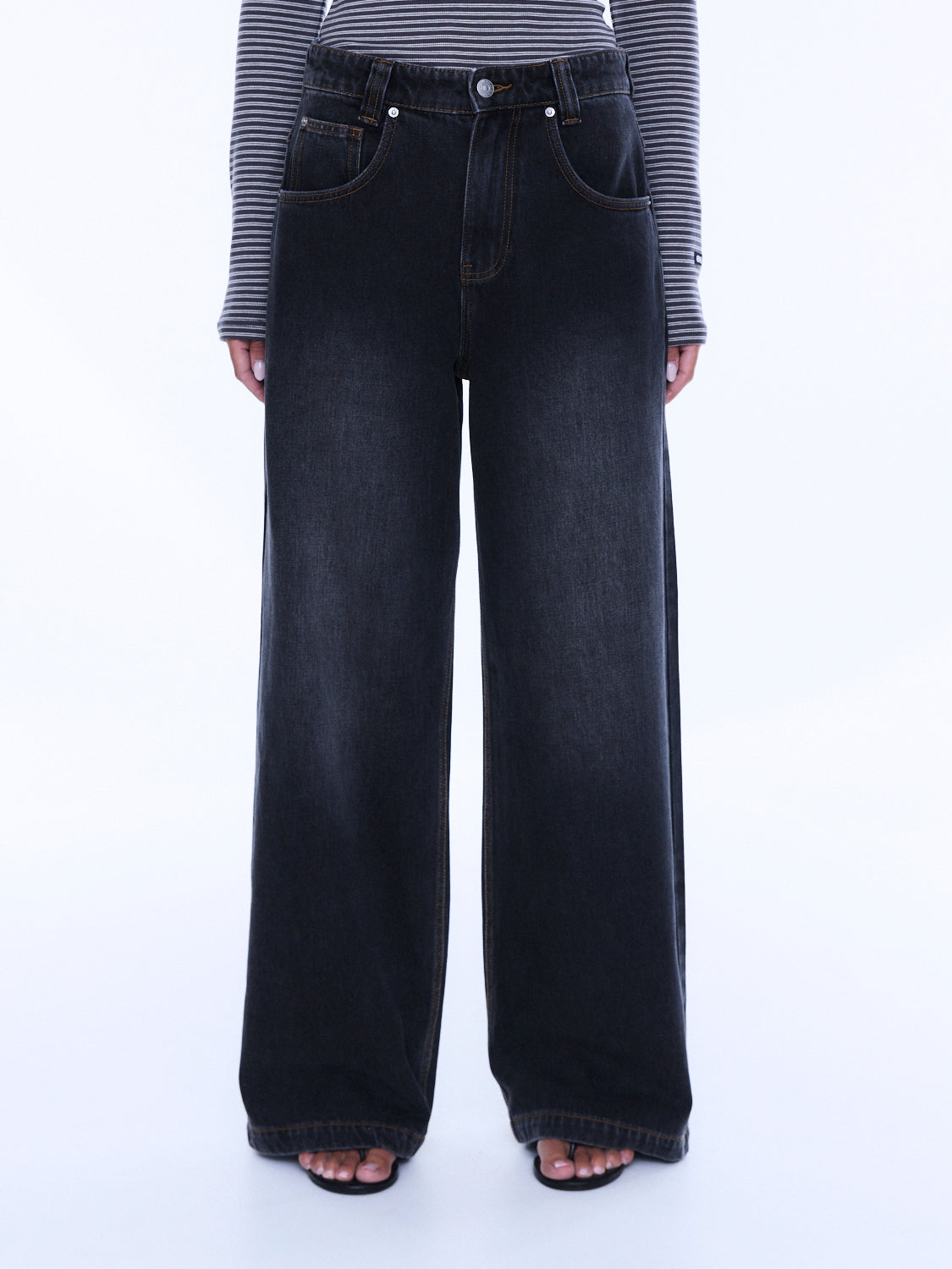 Front full view of Georgia Denim Jean highlighting high-waisted wide leg fit and button fly closure