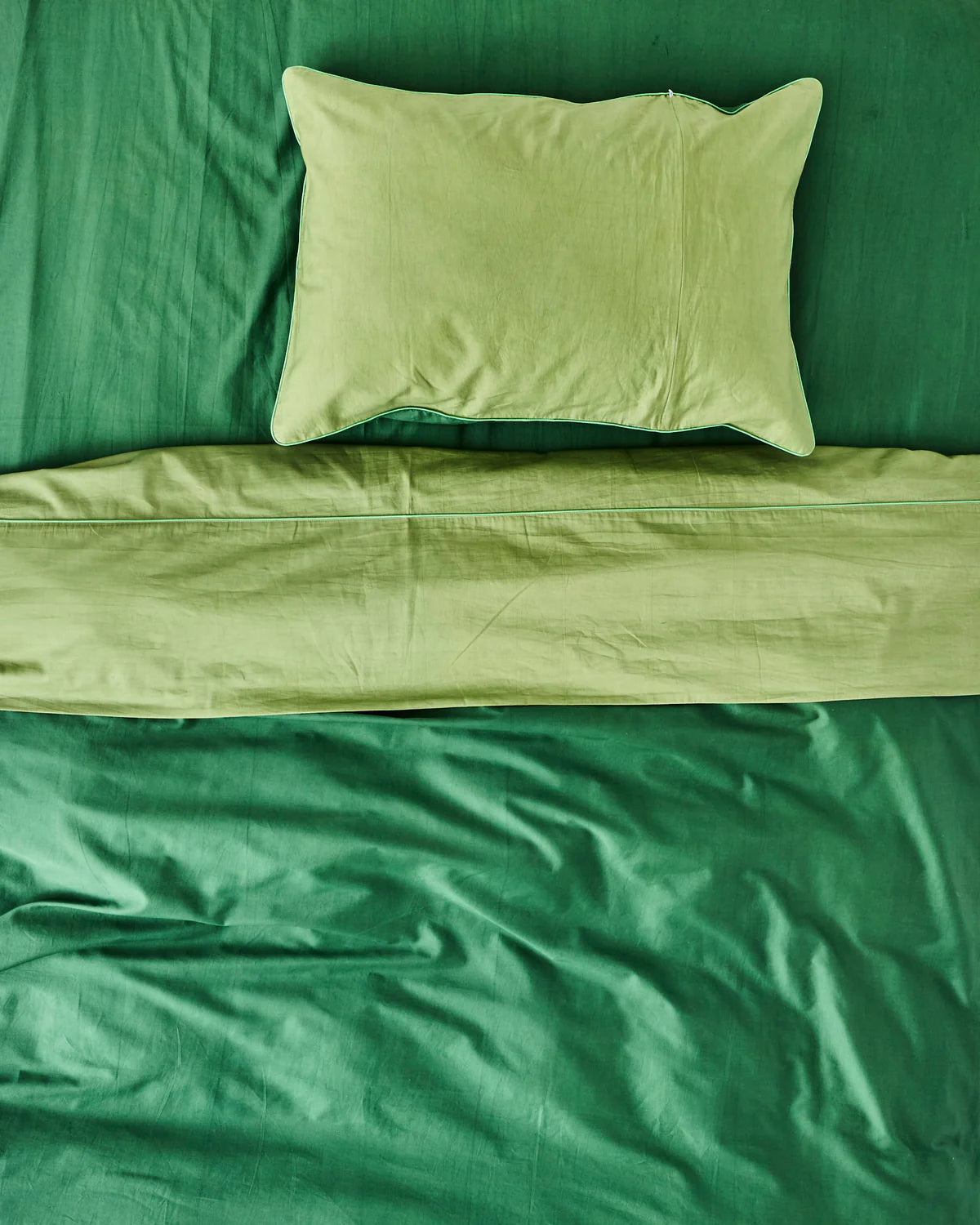 Green fitted sheet by Kip & Co