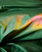 close up details of sun reflecting on Glow In Green Bamboo Cotton Quilt Cover by Kip & Co