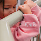 Close up of sleeve detailing on the Golden Hoodie - Pink Icing | Golden Children