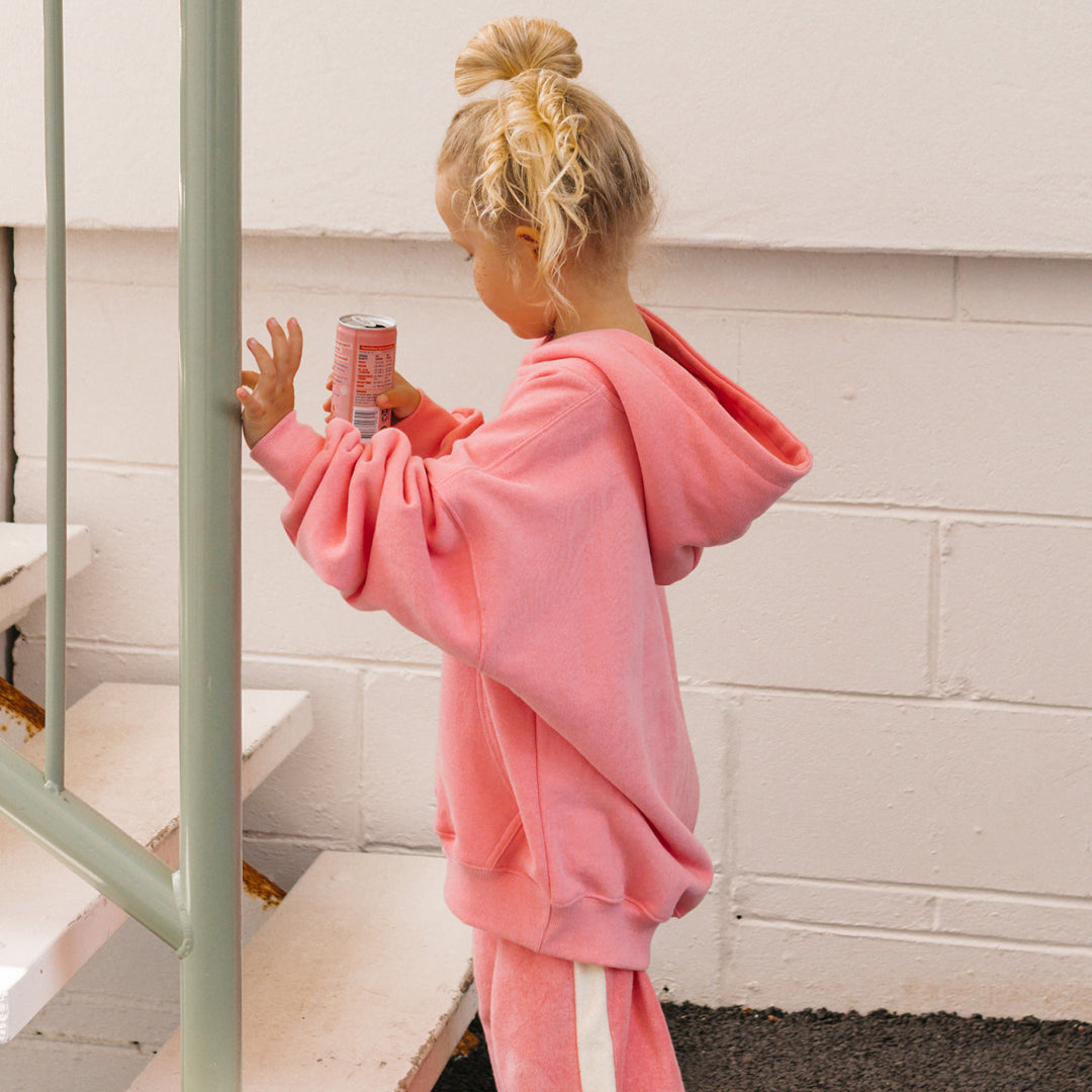 Young girl in the Golden Hoodie - Pink Icing | Golden Children