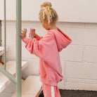 Young girl in the Golden Hoodie - Pink Icing | Golden Children