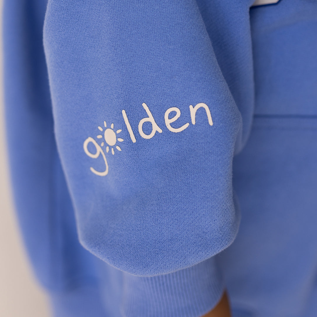 Close up of sleeve detail on the Golden Hoodie - Pool Blue | Golden Children
