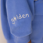 Close up of sleeve detail on the Golden Hoodie - Pool Blue | Golden Children