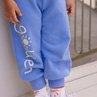 Young boy in the Golden Lounge Pants - Pool Blue | Golden Children