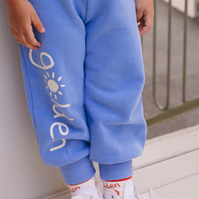 Young boy in the Golden Lounge Pants - Pool Blue | Golden Children
