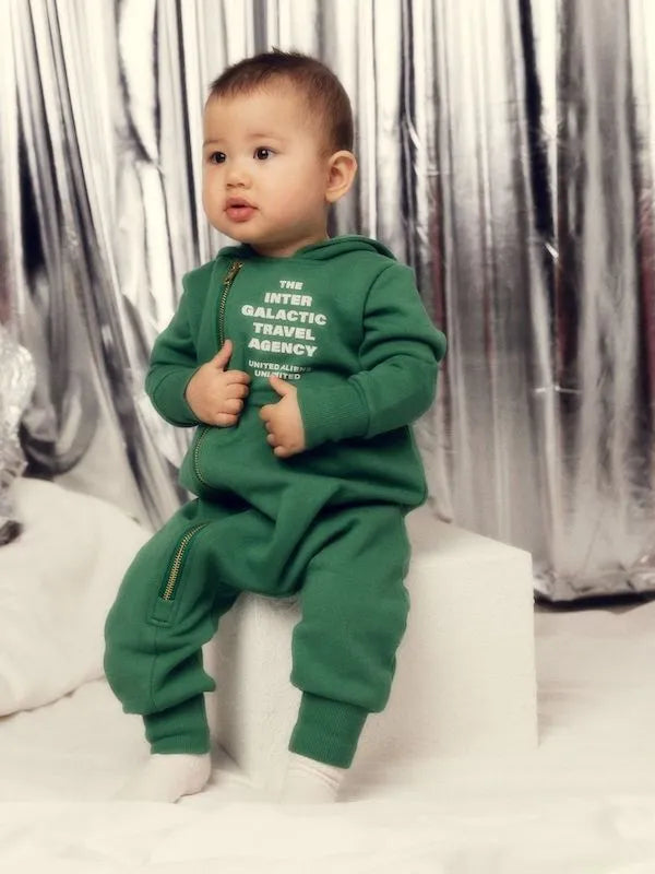 toddler wearing Travel Agency SP Sweat Onesie – Green by Mini Rodini