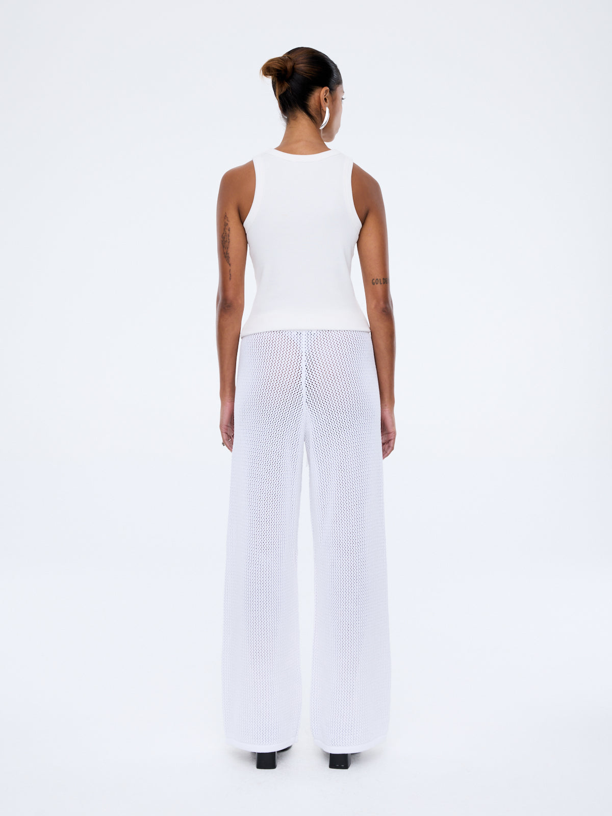Close up detail of Harper Crochet Pant vintage white cotton crochet texture and rib waistband