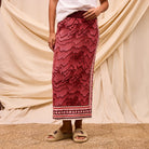Front view of Hanna Knit Maxi Skirt displaying detailed geometric pattern and decorative hemline border