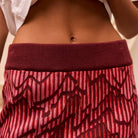 Close-up detail of knitted waistband showing ribbed texture and construction of Hanna Maxi Skirt