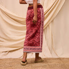 Side angle view of Hanna Knit Maxi Skirt showing side panel and geometric pattern placement