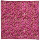 Single Hanna Pansy napkin flat lay showing complete colorful floral pansy pattern with zigzag stitched border