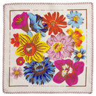 Wide view of dining room table featuring Hanna Pansy napkins with vibrant floral print and decorative stitching