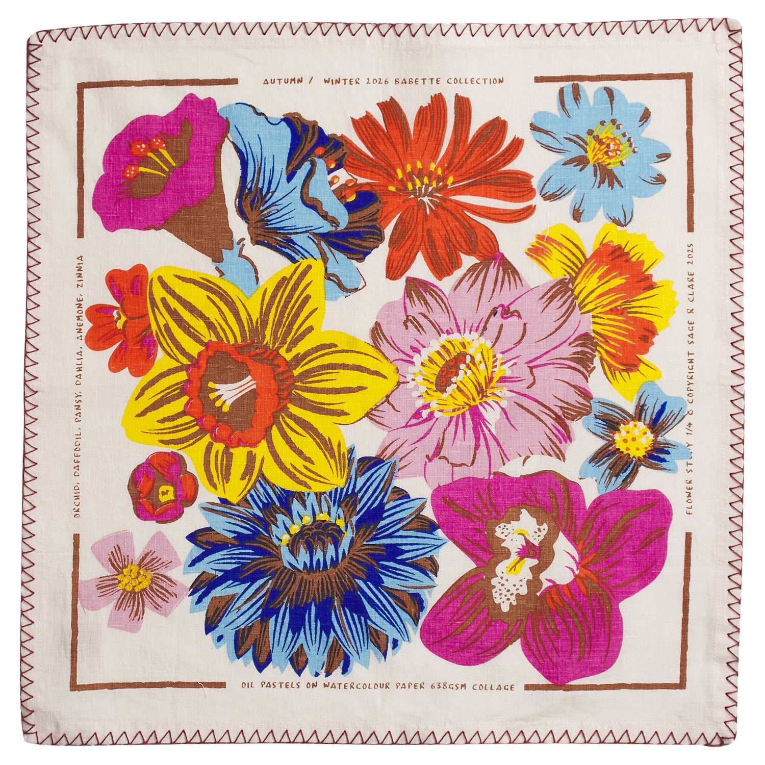 Wide view of dining room table featuring Hanna Pansy napkins with vibrant floral print and decorative stitching