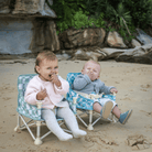toddlers sitting at the beach in Harper baby chair v2 by IZIMINI portable infant seat