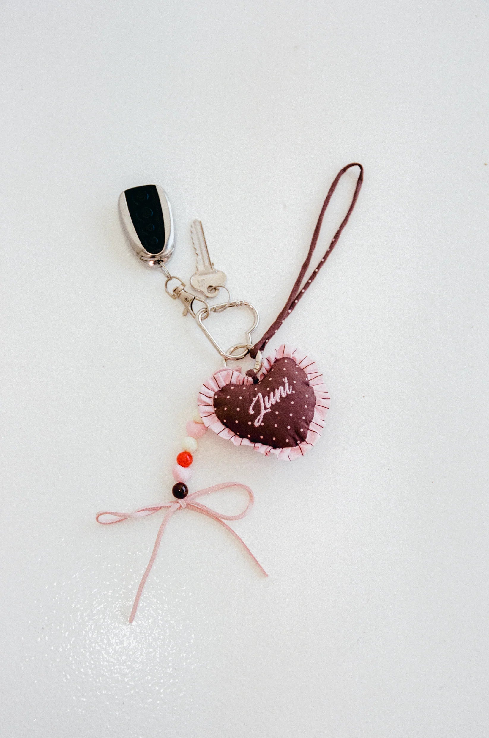 Heart Bag Charm – Cocoa Spot by Juni