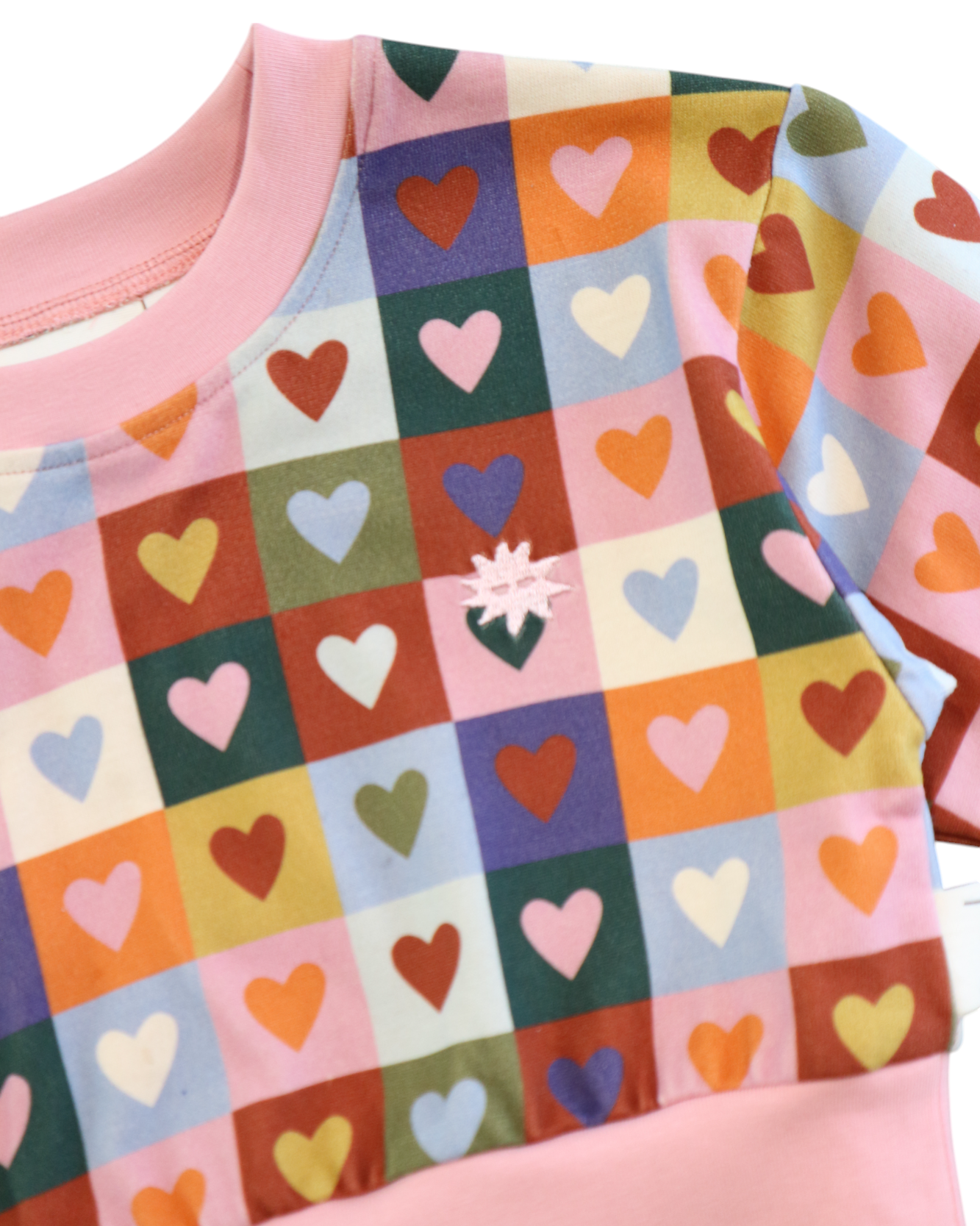 Close up of the Heart Checkerboard Oversized Jumper | Kapow Kids