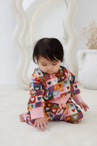 Toddler in matching set with the Heart Checkerboard Trackpants | Kapow Kids