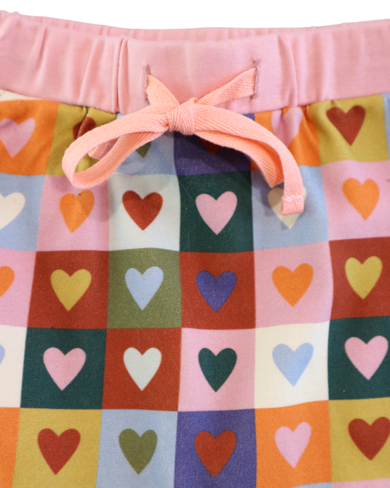 Close up of Heart Checkerboard Trackpants | Kapow Kids
