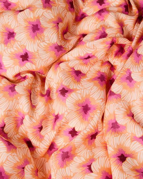 Hibiscus Peach Linen Quilt Cover by Kip & Co fabric detail - floral pattern in orange, pink and burgundy