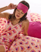Women cami pyjama set with a pink and orange floral pattern by Kip & Co
